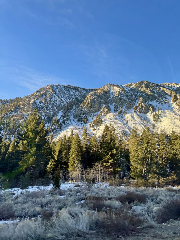 Mountains, lightly covered with snow in the morning sun